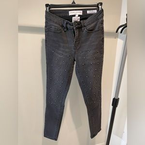 Grey skinny jeans with metal like pearls/beads